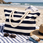 Personalized embroidered nautical canvas beach tote bag on beach