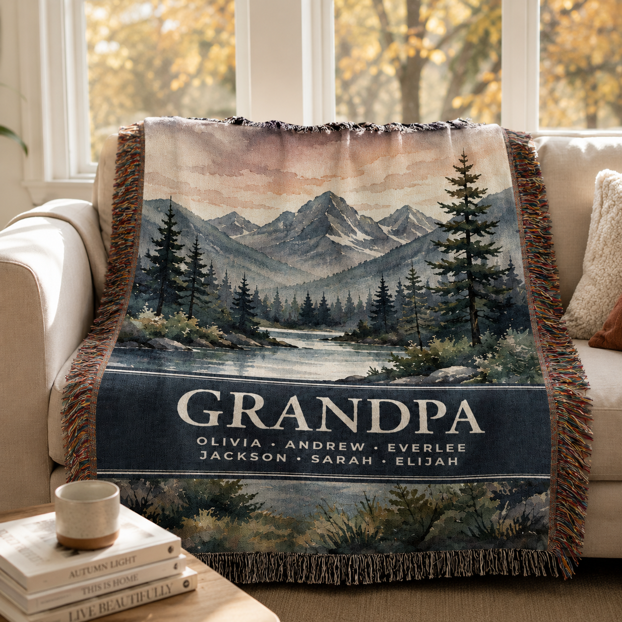 Custom Grandpa mountain woven blanket styled on a living room sofa