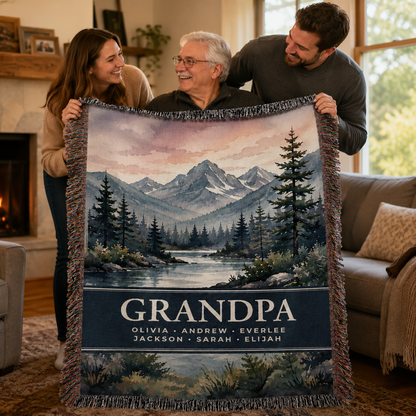 Family presenting Grandpa with a personalized mountain woven blanket