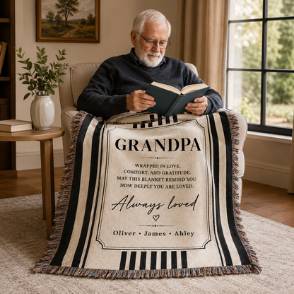 Grandpa reading with a personalized woven blanket