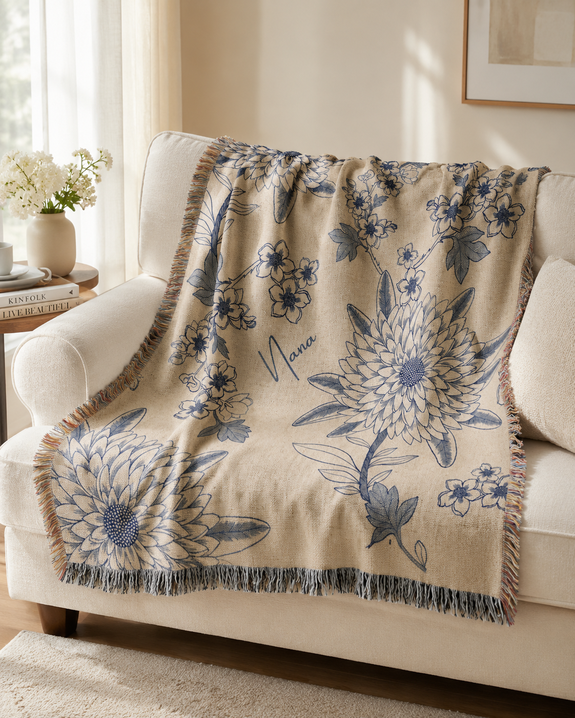 Blue floral woven blanket on sofa