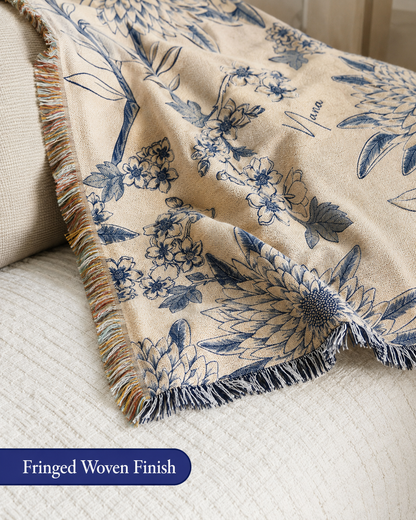 Blue floral woven blanket texture and fringe