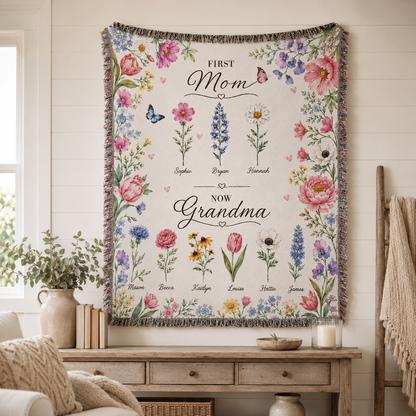 Personalized grandma birth flower blanket displayed on wall