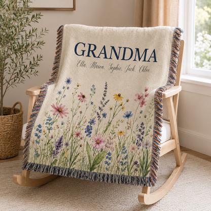 Personalized Grandma meadow wildflower woven blanket draped over a wooden rocking chair
