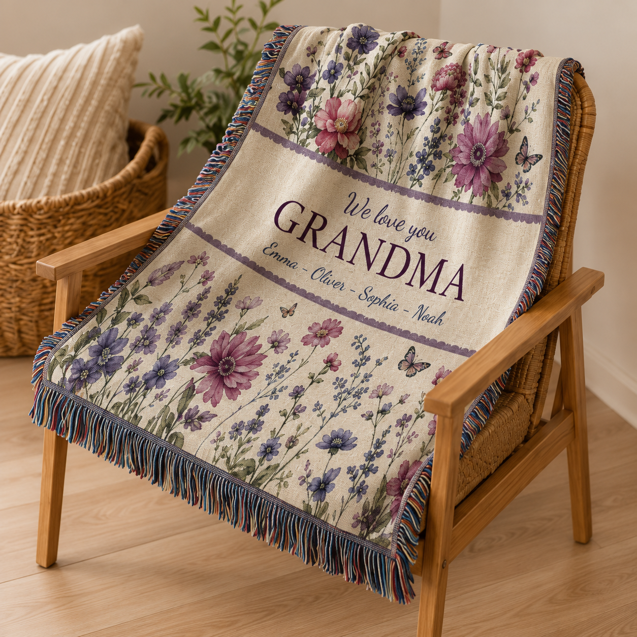 Personalized grandma wildflower woven blanket draped over a wooden reading chair