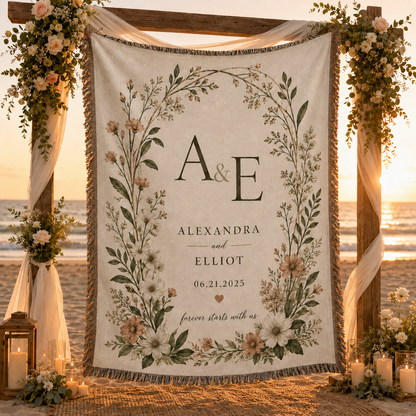 Personalized wedding woven blanket styled at a romantic beach ceremony during sunset