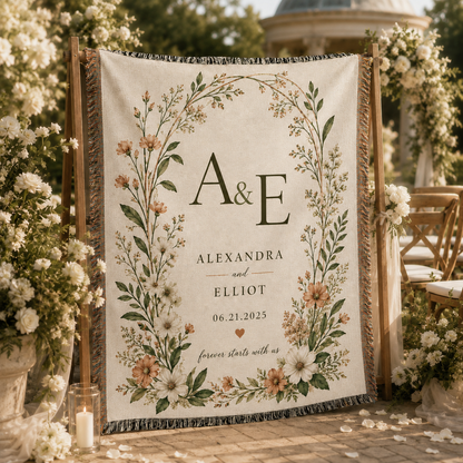 Personalized wedding woven blanket displayed at an elegant outdoor garden ceremony