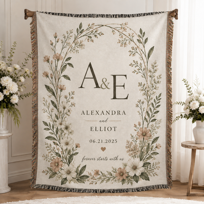 Personalized wedding woven blanket with A and E monogram, couple names, wedding date, and botanical floral design
