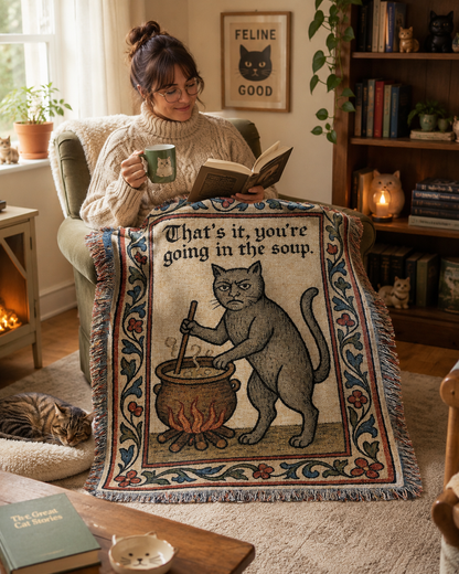Funny medieval cat woven blanket in a cozy cat lover reading room